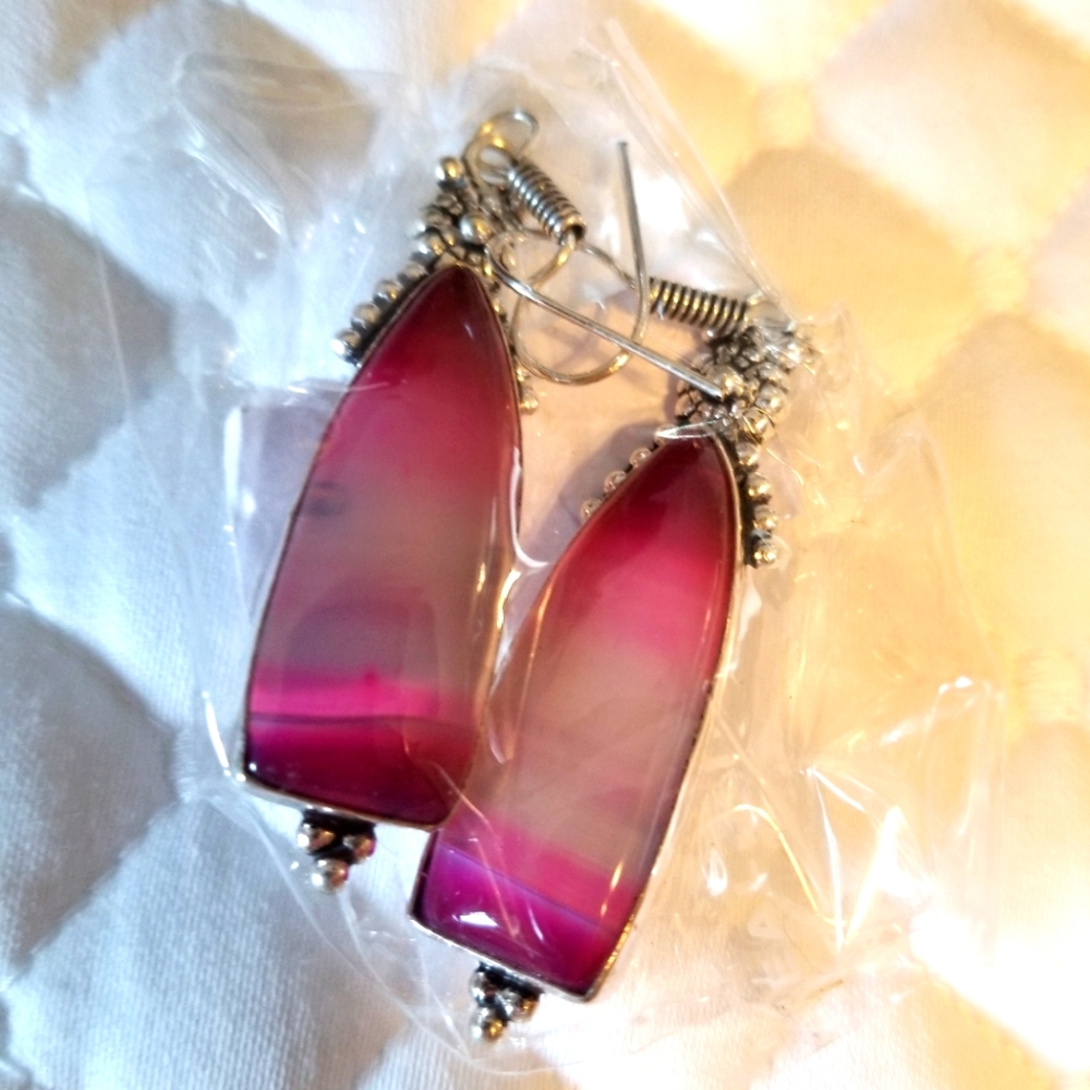 Pink stone in silver setting.